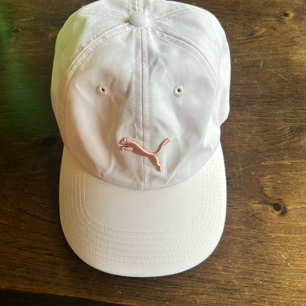 Puma pink hat. Worn several times. Listing #150